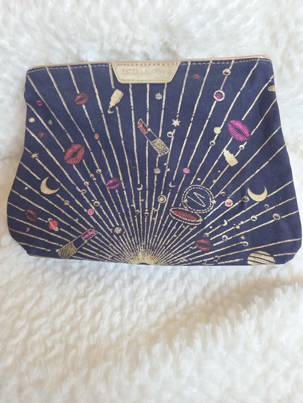 Free New cute pouch Estee Lauder with any purchase of $20 or more!